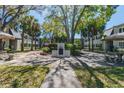 Community courtyard with fireplace and seating at 4315 Aegean Dr # 126C, Tampa, FL 33611