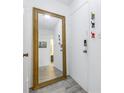 Bright entryway with large mirror and coat hooks at 3730 42Nd S Way # G, St Petersburg, FL 33711