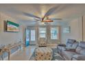 Bright living room with comfortable seating and coastal decor at 250 Rosery Nw Rd # 219, Largo, FL 33770