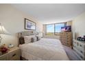 Spacious bedroom with large bed and city views at 6218 Palma Del Mar S Blvd # 606, St Petersburg, FL 33715