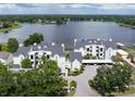Lakefront community with two buildings and parking at 3127 W Sligh Ave # 104B, Tampa, FL 33614