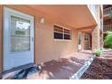 Exterior view of condo building with private entrance at 12760 Indian Rocks Rd # 1004, Largo, FL 33774