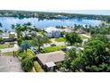 Birds-eye view of waterfront home and surrounding area at 705 Bayshore Dr, Tarpon Springs, FL 34689