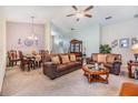 Spacious living room with comfortable seating and a dining area at 13235 Meadow Golf Ave, Hudson, FL 34669