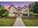 Elegant two-story home with a fountain at 3798 Presidential Dr, Palm Harbor, FL 34685