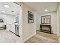 Condo kitchen with white cabinets and stainless steel appliances at 36750 Us Highway 19 N # 05102, Palm Harbor, FL 34684