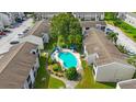 Relaxing kidney-shaped pool nestled within the apartment community at 2625 State Road 590 # 523, Clearwater, FL 33759