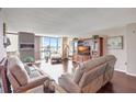 Spacious living room with hardwood floors and water view at 660 Island Way # 506, Clearwater Beach, FL 33767