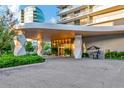 Modern building entrance with covered drop off and landscaping at 3030 W Santiago St # 4, Tampa, FL 33629