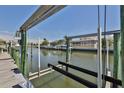 Private boat lift in desirable waterfront community at 415 Islebay Dr, Apollo Beach, FL 33572