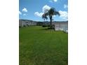 Community with green space and a pool at 8100 Dr Martin Luther King Jr N St # 208, St Petersburg, FL 33702