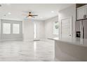 Bright living room with marble floors and modern ceiling fan at 2138 -1 W Beach St, Tampa, FL 33607