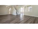 Bright dining room with wood-look floors and an open concept design at 1706 Atlantic Dr, Ruskin, FL 33570