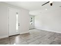Bright and airy living room with tile floors and large windows at 2138 - 2 W Beach St, Tampa, FL 33607