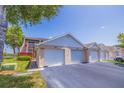 Condo building with attached garages and landscaping at 6499 99Th N Way # 18B, St Petersburg, FL 33708