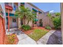 Condo unit with private entrance and well-maintained landscaping at 6499 99Th N Way # 18B, St Petersburg, FL 33708