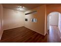 Open living area with hardwood floors at 501 Knights Run Ave # 1327, Tampa, FL 33602