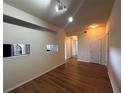 Living room with hardwood floors and high ceilings at 501 Knights Run Ave # 1327, Tampa, FL 33602