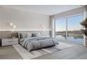 Spacious bedroom with large window and city view at 1028 Sunset Point Rd # R10, Clearwater, FL 33755