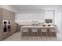 Modern kitchen with island and marble countertops at 1028 Sunset Point Rd # R10, Clearwater, FL 33755