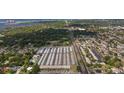 Aerial view of a community with many buildings and lush greenery at 12400 Park Blvd # 210, Seminole, FL 33772