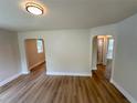 Open living area with wood floors and archways at 1650 Prescott S St, St Petersburg, FL 33712