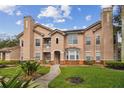 Two-story condo building with attractive exterior at 10409 Villa View Cir, Tampa, FL 33647