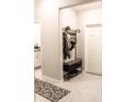 Inviting entryway with built-in bench and storage at 14117 Weddington Ter, Hudson, FL 34669