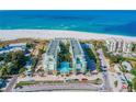 Aerial view of beachfront property with ocean views and resort amenities at 12000 Gulf Blvd # 206N, Treasure Island, FL 33706