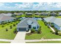 Aerial view of a house and surrounding neighborhood at 13769 Old Creek Ct, Parrish, FL 34219