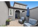 Private courtyard with seating area, providing an outdoor space at 281 Villa Corte Dr, Lutz, FL 33549