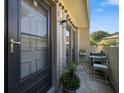 Small patio with seating and plants at 2935 Lichen Ln # C, Clearwater, FL 33760