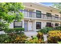 Clean and well maintained condo building exterior with lush landscaping at 6291 Bahia Del Mar Cir # 103, St Petersburg, FL 33715