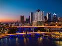 Night view of cityscape with illuminated bridges and skyscrapers at 111 S Ashley Dr # 1703, Tampa, FL 33602