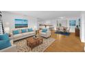 Bright and airy living room featuring modern decor and an open floor plan at 233 W College Ave, Ruskin, FL 33570