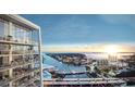 Aerial view of cityscape at sunset over water at 111 S Ashley Dr # 3409, Tampa, FL 33602
