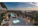 Luxurious rooftop pool and spa area with lounge seating at 111 S Ashley Dr # 3409, Tampa, FL 33602