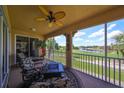 Spacious lanai with golf course views and comfortable seating at 1361 Emerald Dunes, Sun City Center, FL 33573