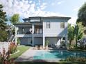 Two-story house with a pool and a landscaped backyard at 625 80Th Ave, St Pete Beach, FL 33706