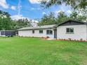 Newly renovated home with landscaping and large yard at 7301 Pierce Harwell Rd, Plant City, FL 33565