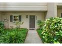 Private entrance to a townhouse with manicured landscaping at 5313 Bayshore Blvd # 5313, Tampa, FL 33611