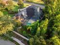 Aerial view highlighting home's pool and backyard oasis at 918 Shoals Landing Dr, Brandon, FL 33511