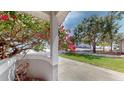 View of front porch and landscaping at 9550 Tara Cay Ct # 17, Seminole, FL 33776