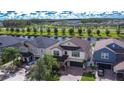 Houses with water views in a residential community at 19462 Paddock View Dr, Tampa, FL 33647