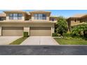 Charming home with two-car garage, well-kept lawn, and attractive landscaping at 2539 Silverback Ct, Palm Harbor, FL 34684
