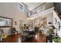 Elegant dining room with hardwood floors and high ceilings at 2539 Silverback Ct, Palm Harbor, FL 34684