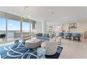 Bright living room with open floor plan, stylish furniture, and water views at 3401 Bayshore Blvd # 1801, Tampa, FL 33629
