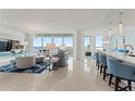 Spacious living room with water views, modern furniture, and open floor plan at 3401 Bayshore Blvd # 1801, Tampa, FL 33629