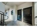 Interior hallway view with condo unit doors at 2650 Countryside Blvd # F110, Clearwater, FL 33761