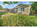 Updated bungalow exterior with new landscaping at 3457 22Nd S Ave, St Petersburg, FL 33711